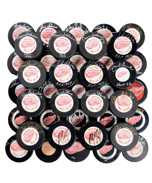 Detroit Red Wings Signed Puck Collection of 41 with Howe, Abel, Lindsay, Yzerman, Hull and Other Greats