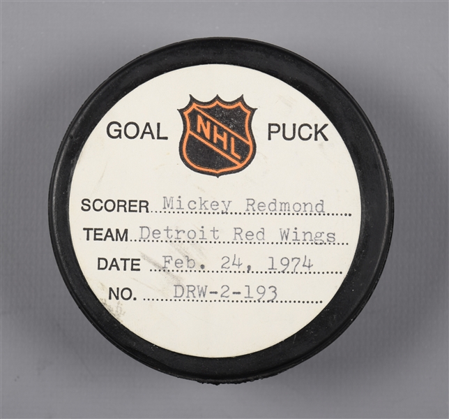 Mickey Redmonds Detroit Red Wings February 24th 1974 Goal Puck from the NHL Goal Puck Program - 37th Goal of Season / Career Goal #193 / 2nd Goal of Hat Trick