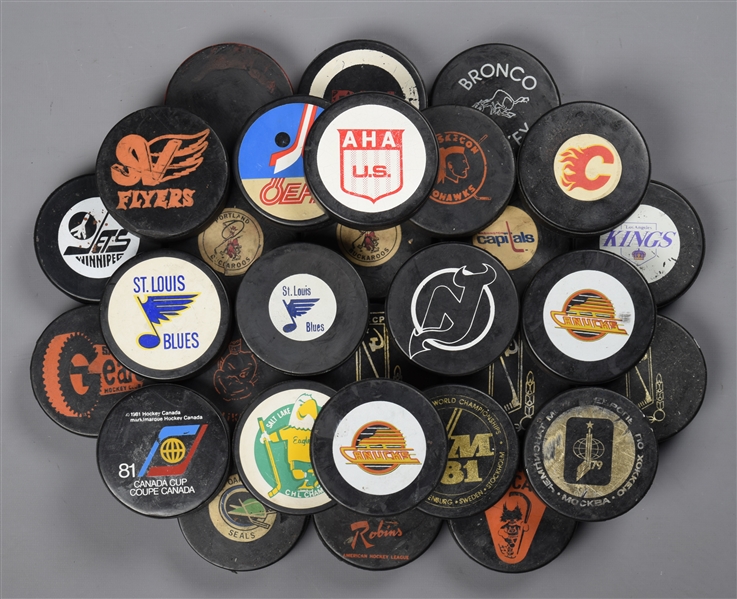 Bob Johnson’s Hockey Puck Collection of 30