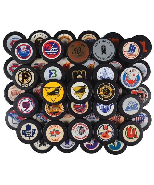 Vintage 1981-95 AHL / American Hockey League Viceroy and InGlasCo Game Puck Collection of 51 with Rare Erie Blades Pucks (2)