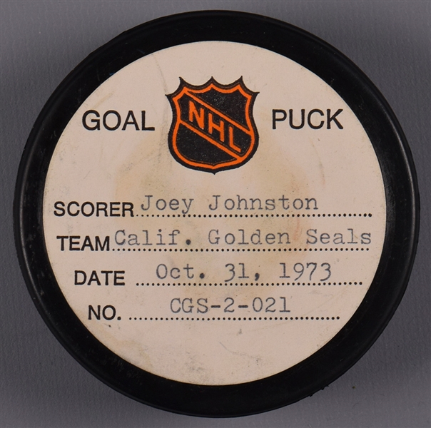 Joey Johnstons California Golden Seals October 31st 1973 Goal Puck from the NHL Goal Puck Program - 7th Goal of Season / Career Goal #51