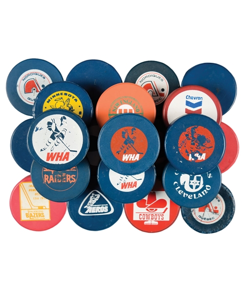 1972-76 WHA Blue, Red and Orange Biltrite Puck Collection of 21