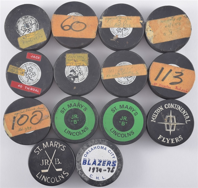 Jack Valiquettes Milestone Goal Puck Collection of 14 Including 1973-74 OHA Sault Ste. Marie Greyhounds 30th, 40th, 50th, 60th and 63rd Goal Pucks