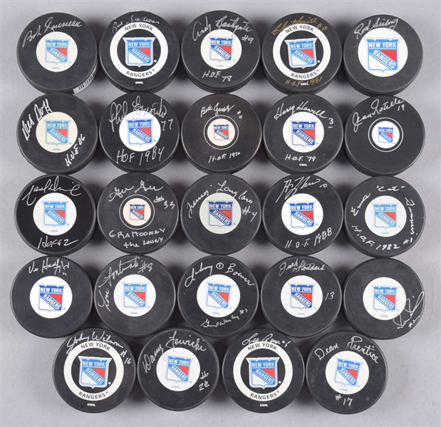 New York Rangers Signed Puck Collection of 24 with 11 Hall of Fame Members Including Bathgate, Howell, Smith and Ratelle with LOA 