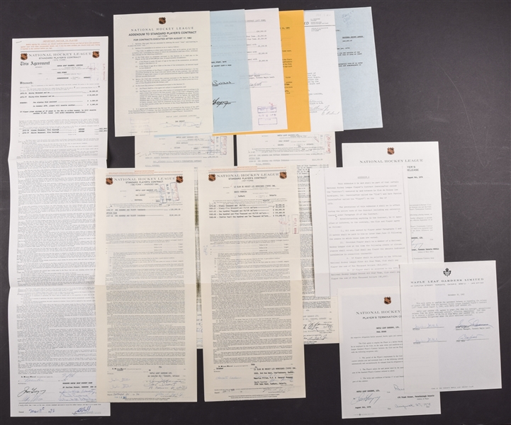 Toronto Maple Leafs 1970s/1980s Official NHL Contract and Document Collection of 14 Including Signatures of Deceased HOFers Imlach and Campbell Plus HOFer Gregory