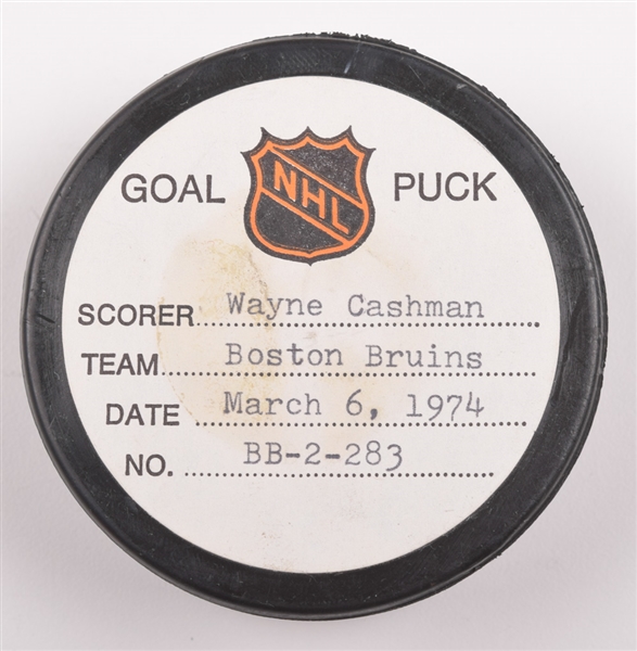 Wayne Cashmans Boston Bruins March 6th 1974 Goal Puck from the NHL Goal Puck Program - 19th Goal of Season / Career Goal #109 / 1st Goal of Hat Trick