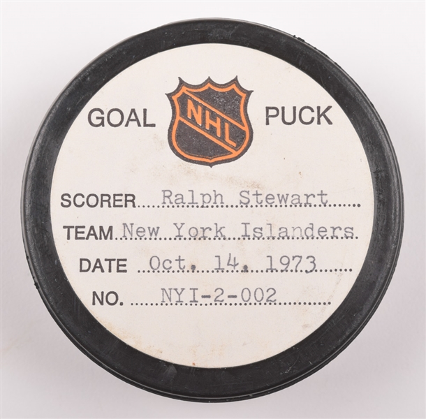 Ralph Stewarts New York Islanders October 14th 1973 Goal Puck from the NHL Goal Puck Program - 1st Goal of Season / Career Goal #5