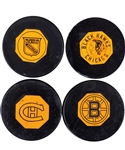 Bruins, Black Hawks, Rangers and Canadiens 1958-68 "Original Six" Art Ross NHL Game Pucks (4)
