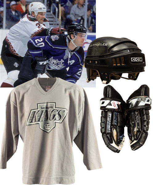 Luc Robitailles Los Angeles Kings Early-2000s TPS Game-Used Gloves, Circa 2000 CCM Game-Worn Helmet, 1990s Practice Jersey and Game Sticks (3) with His Signed LOA