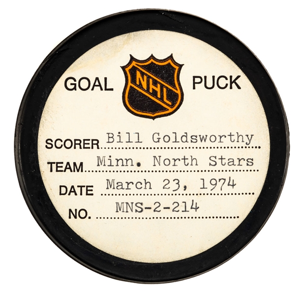 Bill Goldsworthys Minnesota North Stars March 23rd 1974 Goal Puck from the NHL Goal Puck Program - Season Goal #43 of 48 / Career Goal #205 of 283 - 1st Goal of Hat Trick