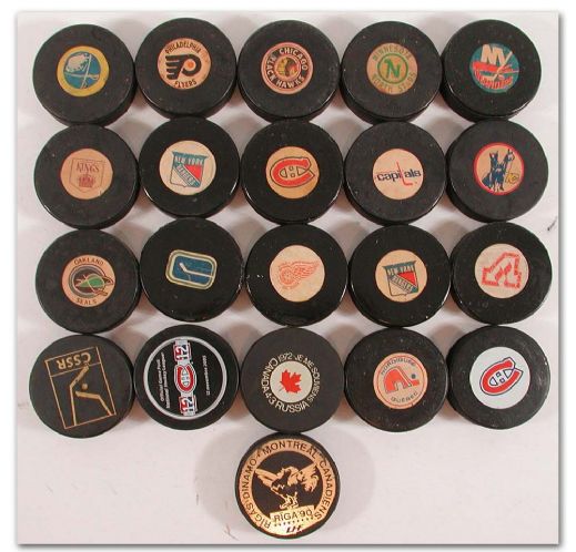 Converse and Viceroy Official NHL Game Puck Collection of 20