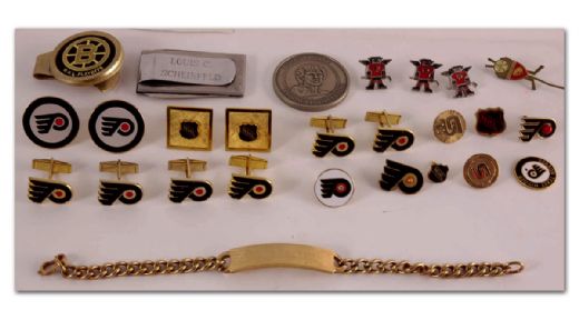 Lou Scheinfeld’s Philadelphia Flyers Lapel Pin, Cuff Link &  Medallion Collection