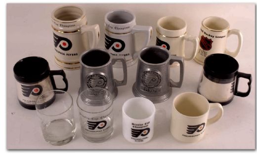 Philadelphia Flyers Puck, Mug & Paperweight Collection of 26