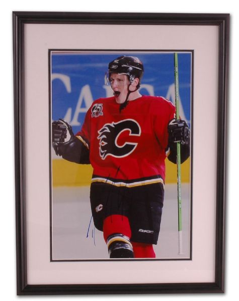 Dion Phaneuf Autographed Framed Photo (18” by 24”)
