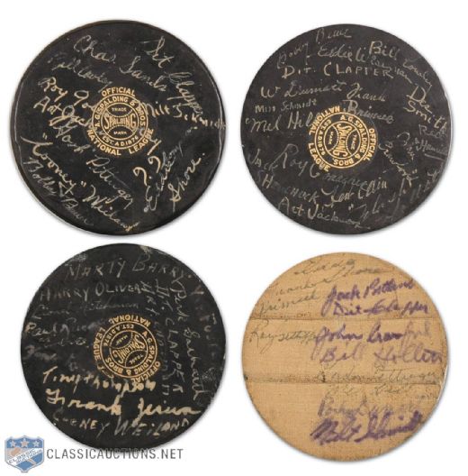 Vintage Team Autographed Boston Bruins Puck Collection of 4