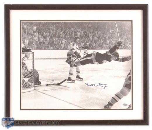 Bobby Orrs Autographed 1970 Stanley Cup Winning Goal Framed Photograph (22" x 26")