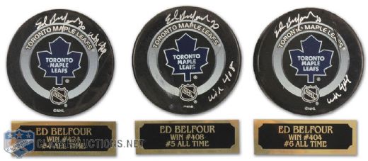 Autographed Ed Belfour Milestone Victory Official NHL Game Puck Collection of 3 