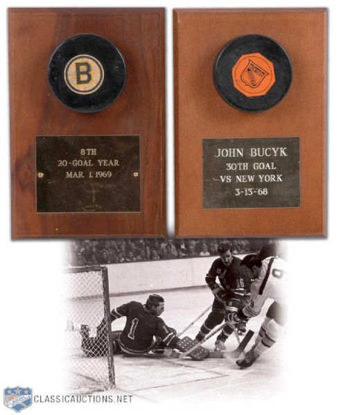 Johnny Bucyks Milestone Goal Puck Collection of 2