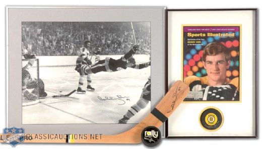 Bobby Orr Sportsman of the Year Signed Puck Display and Signed "The Goal" Photo Frame Collection of 2, Plus Autographed Stick and Vintage Bobby Orr Rally Puck