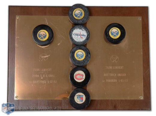 Yvon Lamberts Buffalo Sabres Plaque and Milestone Goal Puck Collection of 7