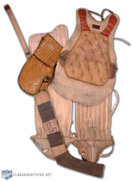 Vintage Goalie Equipment Collection of 4, Including Stick, Mitt, Chest Protector and Pads