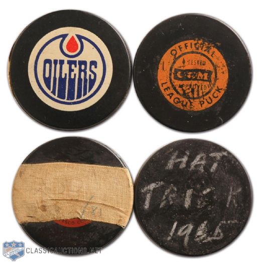 Wayne Cashmans Junior & NHL Milestone Puck Collection of 2