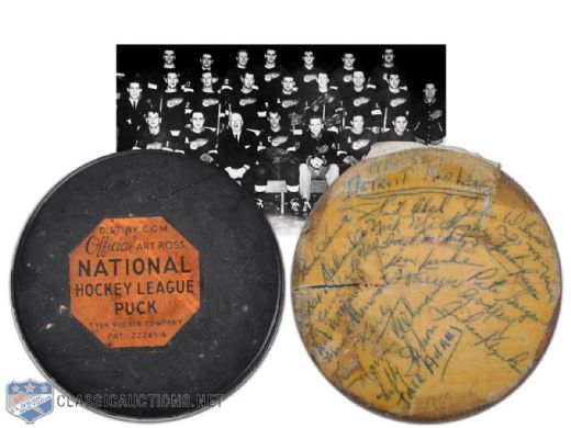 1958-59 Detroit Red Wings Team-Signed Puck Autographed by 18, Including Abel, Wilson & Howe