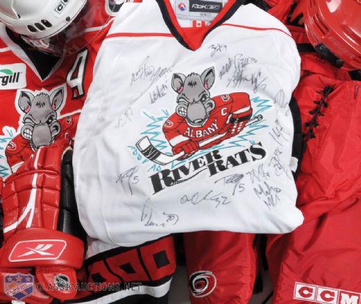 2008-09 Albany River Rats Game-Worn Red Alternate Captains Jersey Collection of 2 & AHL Game-Used Helmets (2), Pants (2) & Gloves, Plus Team-Signed River Rats Jersey