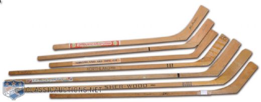 Collection of 7 Vintage Hockey Sticks Including 1958-59 Maple Leafs and Bruins Team-Signed Junior Stick
