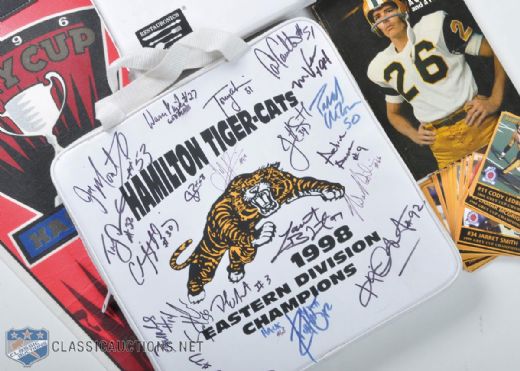 Hamilton Tiger Cats Memorabilia Collection Including Team-Signed 1998 Division Champions Seat Cushion & Autographed Garney Henley Book