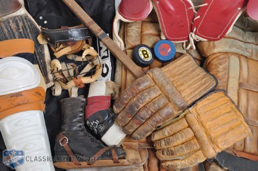 Vintage Hockey Equipment Collection Featuring Goalie Pads, One-Piece Hockey Stick & More