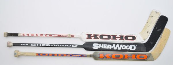 Ray Emerys Senators, Rick DiPietros Islanders and Manny Legaces Red Wings Game-Used Sticks