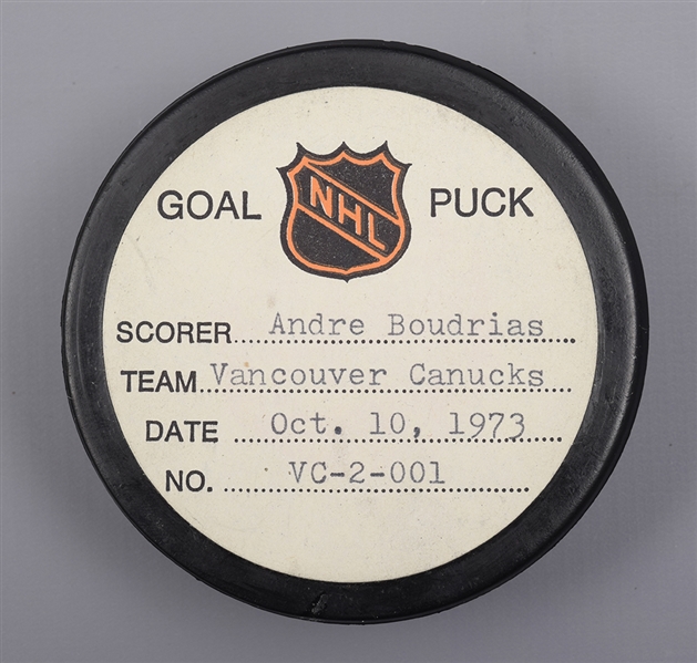Andre Boudrias Vancouver Canucks October 10th 1973 Goal Puck from the NHL Goal Puck Program - 1st Goal of Season / Career Goal #113