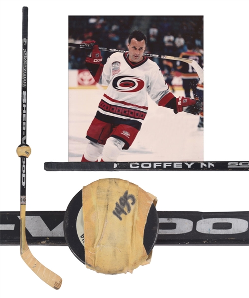 Paul Coffeys November 30th 1999 Carolina Hurricanes "1495th NHL Career Milestone Point" Sher-Wood Game-Used Stick and Milestone Puck with His Signed LOA