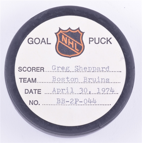 Greg Sheppards Boston Bruins April 30th 1974 Playoff Goal Puck from the NHL Goal Puck Program - 9th Playoff Goal of Season / Career Playoff Goal #11 - Game-Winning Goal from Semifinals Clinching Game