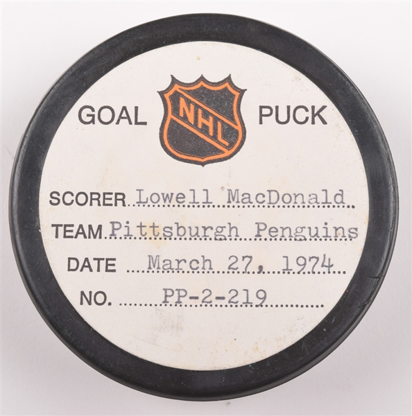 Lowell MacDonalds Pittsburgh Penguins March 27th 1974 Goal Puck from the NHL Goal Puck Program - 38th Goal of Season / Career Goal #112 / 2nd Goal of Natural Hat Trick
