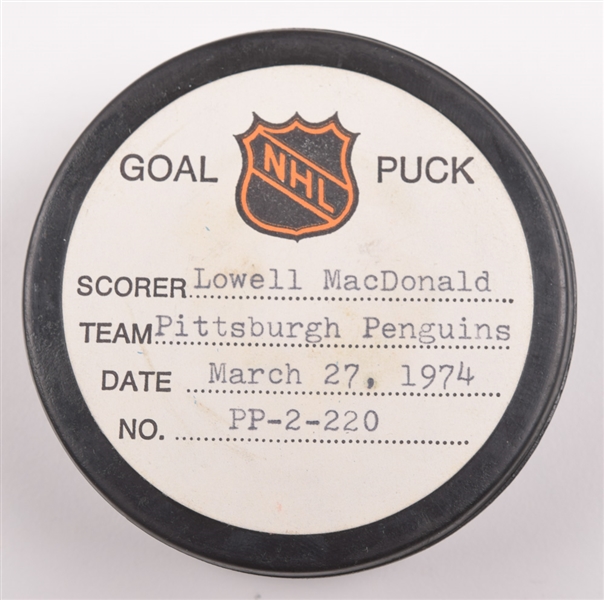 Lowell MacDonalds Pittsburgh Penguins March 27th 1974 Goal Puck from the NHL Goal Puck Program - 39th Goal of Season / Career Goal #113 / 3rd Goal of Natural Hat Trick