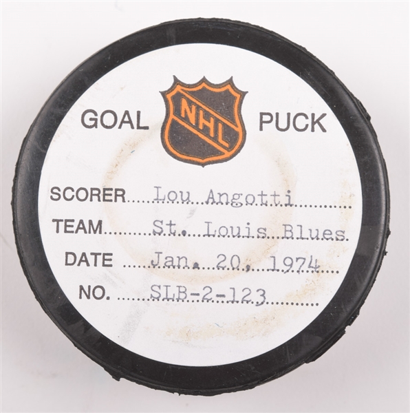 Lou Angottis St. Louis Blues January 20th 1974 Goal Puck from the NHL Goal Puck Program - 12th Goal of Season / Career Goal #103 / Game-Winning Goal