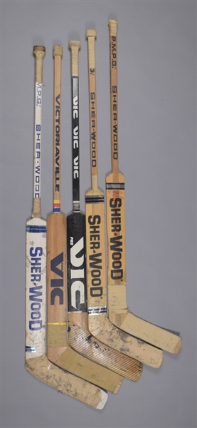 1980s Game-Used Goalie Stick Collection of 5 Including Peeters, Lemelin, Herron, Millen and Young