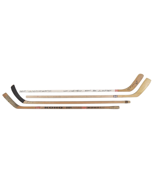 Milt Schmidts Hockey Stick Collection of 5 Including 1977-78, 1993-94 and Boston Bruins All-Time Greats Team-Signed Sticks with LOA