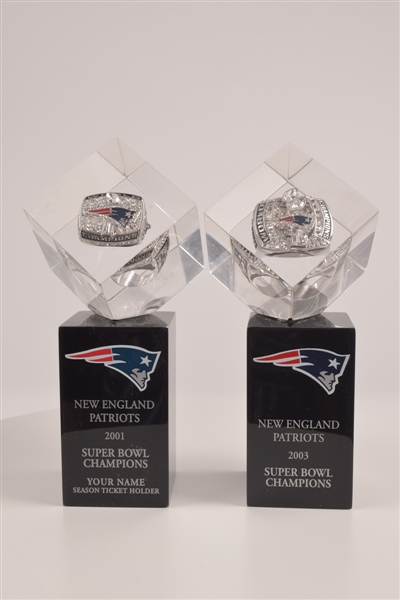 New England Patriots 2001 and 2003 Super Bowl Championship Rings in Lucite Cubes with Display Stands