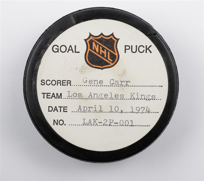Gene Carrs Los Angeles Kings April 10th 1974 Playoff Goal Puck from the NHL Goal Puck Program - 1st Playoff Goal of Season / Career Playoff Goal #2 of 5 - 1st Playoff Goal of Season for Kings