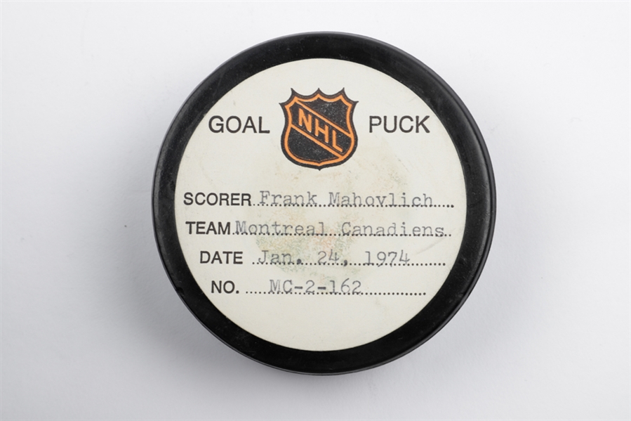 Frank Mahovlichs Montreal Canadiens January 24th 1974 Goal Puck from the NHL Goal Puck Program - 14th Goal of Season / Career Goal #516 of 533 - Assisted by Guy Lafleur