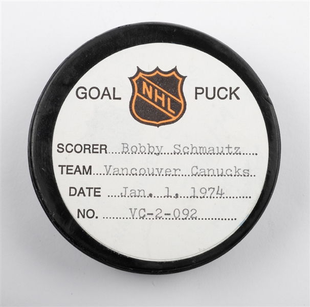 Bobby Schmautzs Vancouver Canucks January 1st 1974 Goal Puck from the NHL Goal Puck Program - 20th Goal of Season / Career Goal #87 of 271
