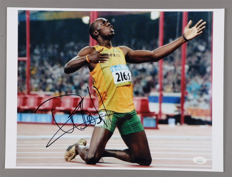 Gold Medal Winner Usain Bolt Signed Oversized Photo (12" x 16") - JSA Certified
