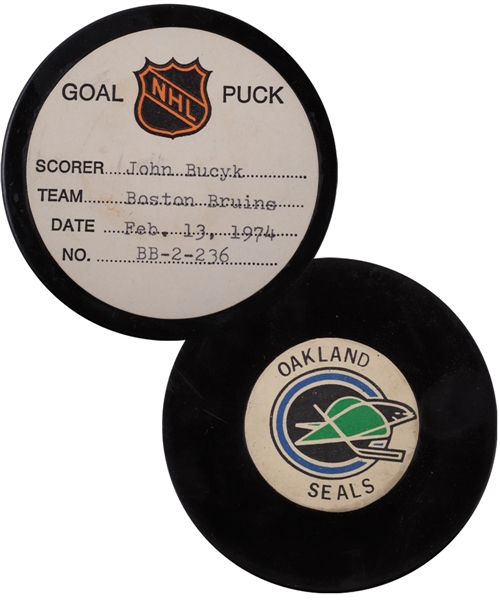 John Bucyks Boston Bruins February 13th 1974 Goal Puck from the NHL Goal Puck Program - 19th Goal of Season / Career Goal #454 of 556