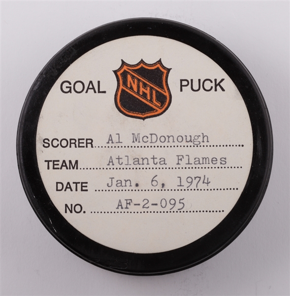 Al McDonoughs Atlanta Flames January 6th 1974 Goal Puck from the NHL Goal Puck Program - 15th Goal of Season / Career Goal #62 of 73