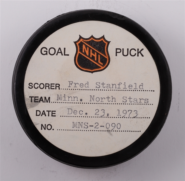 Fred Stanfields Minnesota North Stars December 23rd 1973 Goal Puck from the NHL Goal Puck Program - 5th Goal of Season / Career Goal #150 of 211