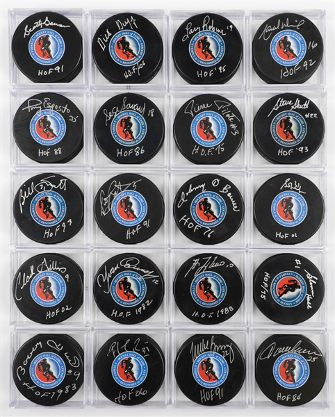 Hockey Hall of Fame Single-Signed Puck Collection of 20 with LOA Including Roy, Bower, Smith, Fuhr, Potvin, Hall, Robinson and Others