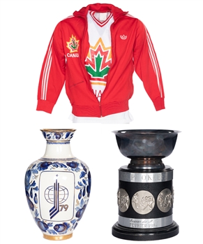 Wilf Paiements 1979 IIHF World Hockey Championships Vase, Late-1970s Team Canada Shirt and Track Jacket Plus Quebec Nordiques February 1984 "Player of the Month" OKeefe Cup with His Signed LOA 